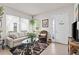 Inviting living room area with natural light, comfortable seating, and tasteful decor at 4195 Barletta Ct, Wesley Chapel, FL 33543