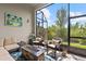 Comfortable screened-in patio with seating and a fire pit perfect for relaxing outdoors at 4195 Barletta Ct, Wesley Chapel, FL 33543