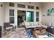 Relaxing outdoor patio with comfortable seating and a stylish fire pit, perfect for entertaining at 4195 Barletta Ct, Wesley Chapel, FL 33543
