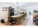 Dining area features modern furnishings and a neutral color palette at 4435 Lamson Ave, Spring Hill, FL 34608