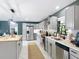 Bright kitchen with stainless appliances and modern finishes throughout at 4435 Lamson Ave, Spring Hill, FL 34608
