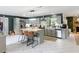 Bright kitchen boasts stainless appliances, a large island, and ample counter space at 4435 Lamson Ave, Spring Hill, FL 34608