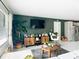 Cozy living room features stylish furnishings, a media center, and neutral walls at 4435 Lamson Ave, Spring Hill, FL 34608