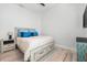 This bright bedroom features stylish decor, a ceiling fan, and neutral colors at 475 Crystal Beach, Crystal Beach, FL 34681