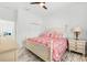 This bright bedroom is stylish and features a ceiling fan, and ample natural light at 475 Crystal Beach, Crystal Beach, FL 34681
