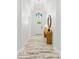 Bright hallway with decorative floors and a modern chandelier at 475 Crystal Beach, Crystal Beach, FL 34681