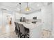 Beautiful kitchen features marble countertops, stainless steel appliances, and stylish pendant lighting at 475 Crystal Beach, Crystal Beach, FL 34681