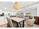Open floor plan boasts a kitchen, dining area, and living room perfect for modern living at 475 Crystal Beach, Crystal Beach, FL 34681