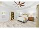 This is a bright main bedroom with decorative ceiling, wood-look floors, and ample natural light at 475 Crystal Beach, Crystal Beach, FL 34681