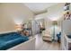 Vaulted ceilings enhance this bedroom, featuring a mirrored closet and light, neutral-colored walls at 4915 Fort Peck Rd, New Port Richey, FL 34655