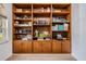 This built-in bookcase with stained wood complements the room and adds character to the space at 4915 Fort Peck Rd, New Port Richey, FL 34655