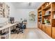 Bright home office featuring a large window and built-in storage, perfect for remote work at 4915 Fort Peck Rd, New Port Richey, FL 34655