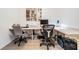 Functional office featuring dual workstations, ensuring a comfortable and productive work environment at 4915 Fort Peck Rd, New Port Richey, FL 34655