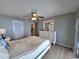 A Primary bedroom boasts ample space, closet, and ensuite bathroom at 5404 Springwood Blvd # 5404, Pinellas Park, FL 33782
