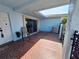 Tile courtyard featuring an exterior entrance door, sliding glass doors and room for seating at 5404 Springwood Blvd # 5404, Pinellas Park, FL 33782