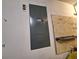 Closed, gray electrical panel on a wall at 5404 Springwood Blvd # 5404, Pinellas Park, FL 33782