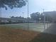 View of the shuffleboard courts, including several courts and the side of a building at 5404 Springwood Blvd # 5404, Pinellas Park, FL 33782