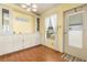 Bright dining area with hardwood floors and built in cabinets with lots of storage at 5544 Caprice Way, Zephyrhills, FL 33541