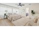 Serene bedroom with a plush rug, modern furniture, and large windows offering natural light at 5724 Dr Martin Luther King Jr N St, St Petersburg, FL 33703