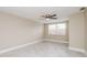 Serene bedroom with tiled floors and natural light at 7405 Oakshire Dr, Port Richey, FL 34668