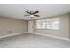 Open living area with natural light and tiled floors at 7405 Oakshire Dr, Port Richey, FL 34668