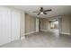 Spacious bedroom features double closet and access to the patio at 7405 Oakshire Dr, Port Richey, FL 34668