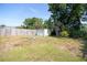 Large backyard with a storage shed, some trees, and a fire pit ready for entertaining at 7529 35Th N Ave, St Petersburg, FL 33710