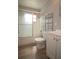 Bathroom featuring a tub with shower, a vanity, toilet and chrome storage shelves at 7529 35Th N Ave, St Petersburg, FL 33710