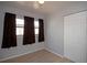 A clean, simple bedroom with hardwood floors, a double closet, and lots of natural light at 7529 35Th N Ave, St Petersburg, FL 33710
