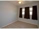 A simple and clean bedroom with hardwood floors and lots of natural light at 7529 35Th N Ave, St Petersburg, FL 33710