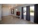 An airy dining area with neutral wall paint, offering direct kitchen access and lots of light at 7529 35Th N Ave, St Petersburg, FL 33710