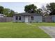 Charming single-story home boasts a well-manicured lawn and inviting curb appeal at 7529 35Th N Ave, St Petersburg, FL 33710