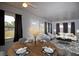 Well-lit living area with an adjacent dining space, and contemporary furnishings at 7529 35Th N Ave, St Petersburg, FL 33710