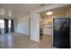 Open concept living room featuring hardwood floors and access to kitchen at 7529 35Th N Ave, St Petersburg, FL 33710