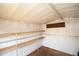 View of the shed interior, featuring shelves and ample storage space for tools and equipment at 7529 35Th N Ave, St Petersburg, FL 33710