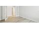 Office with bright wood grain floors, modern doorways, and neutral walls at 8514 Dove Bog Ter, Parrish, FL 34219