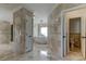 Spacious bathroom with a walk-in shower, luxurious bathtub, and toilet rooms at 1089 Virginia St, Dunedin, FL 34698