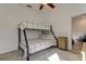 Bedroom featuring bunkbeds, neutral colors and wooden-look floors at 1089 Virginia St, Dunedin, FL 34698