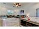 Game room featuring air hockey table, plush seating and modern decor at 1089 Virginia St, Dunedin, FL 34698
