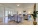 Well-lit living room showcasing neutral decor, fireplace, and classic accents at 1089 Virginia St, Dunedin, FL 34698