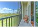 Balcony featuring a seating area and a view of the bay and surrounding greenery providing an outdoor retreat at 1111 Normandy Trace Rd # 1111, Tampa, FL 33602