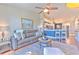 Cozy living room with comfortable seating and an open view to the kitchen and dining area at 1111 Normandy Trace Rd # 1111, Tampa, FL 33602