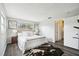 Bright bedroom with wood-look floors, natural light and neutral decor at 11409 Spring Hill Dr, Spring Hill, FL 34609