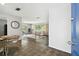 Sunlit living room featuring stylish furniture, large windows, and an open floor plan for seamless entertaining at 11409 Spring Hill Dr, Spring Hill, FL 34609