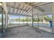 A view of screened porch, providing an inviting space for relaxation and outdoor enjoyment at 11409 Spring Hill Dr, Spring Hill, FL 34609