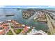 Scenic aerial view of waterfront homes and community with multiple docks, canals, and roadways at 120 1St E St # 104, St Petersburg, FL 33715