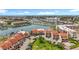 Stunning aerial view of waterfront condos with boat docks and beautiful coastal scenery at 120 1St E St # 104, St Petersburg, FL 33715