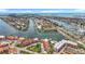 Stunning aerial view of waterfront community with boat docks and beautiful coastal scenery at 120 1St E St # 104, St Petersburg, FL 33715