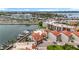 Stunning aerial view of the neighborhood showcasing marina, beautiful landscaping and waterfront living at 120 1St E St # 104, St Petersburg, FL 33715