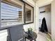 Tiled balcony features comfortable seating with a marina view at 120 1St E St # 104, St Petersburg, FL 33715